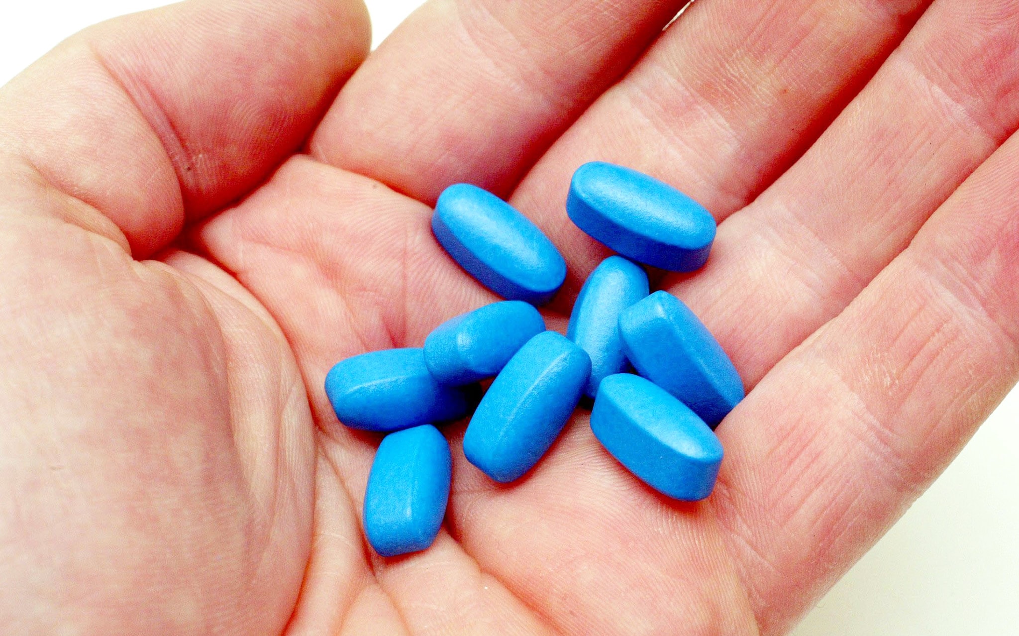 таблетки синего цвета круглые для мужчин фото